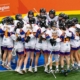 Team BC girls lacrosse team comes together in a huddle at the Canada Games.